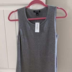 Never worn sleeveless sweaters.